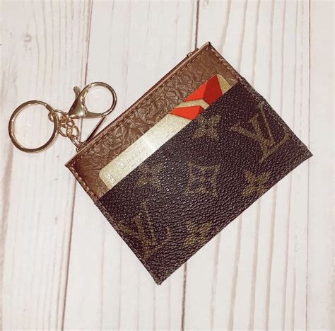 replica aaa louis vuitton belt|louis vuitton keychain wallet dupe.